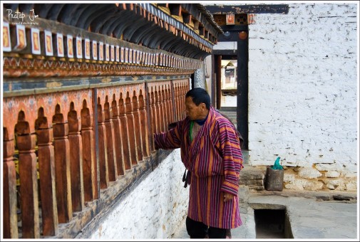 Bhutanese spinnging prayer wheels