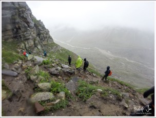 Hiking down a steep slopw after crossing Hampta Pass