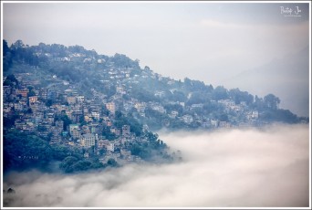 Himalayan Town Covered in Fog