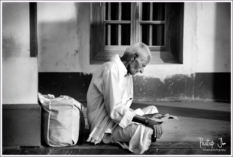 An Old Man Reads a Panchanga