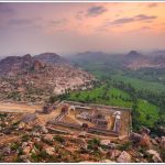 Sunrise over Achutharaya Temple in Hampi from Mathanga Hill