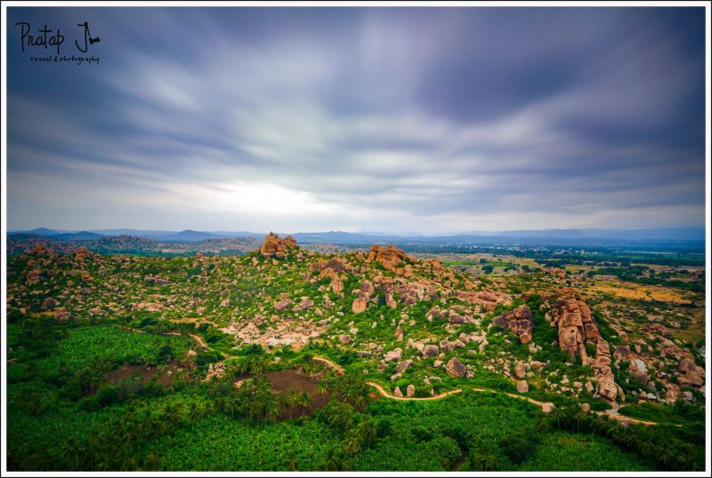 Monsoon clouds roll over the ruins at Hampi in Karnataka