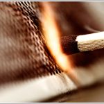 Close up a matchstick with a spark