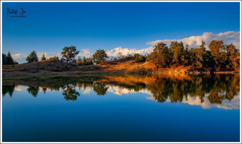 Still waters of Deoriatal with Kedarkantha Mountain Range