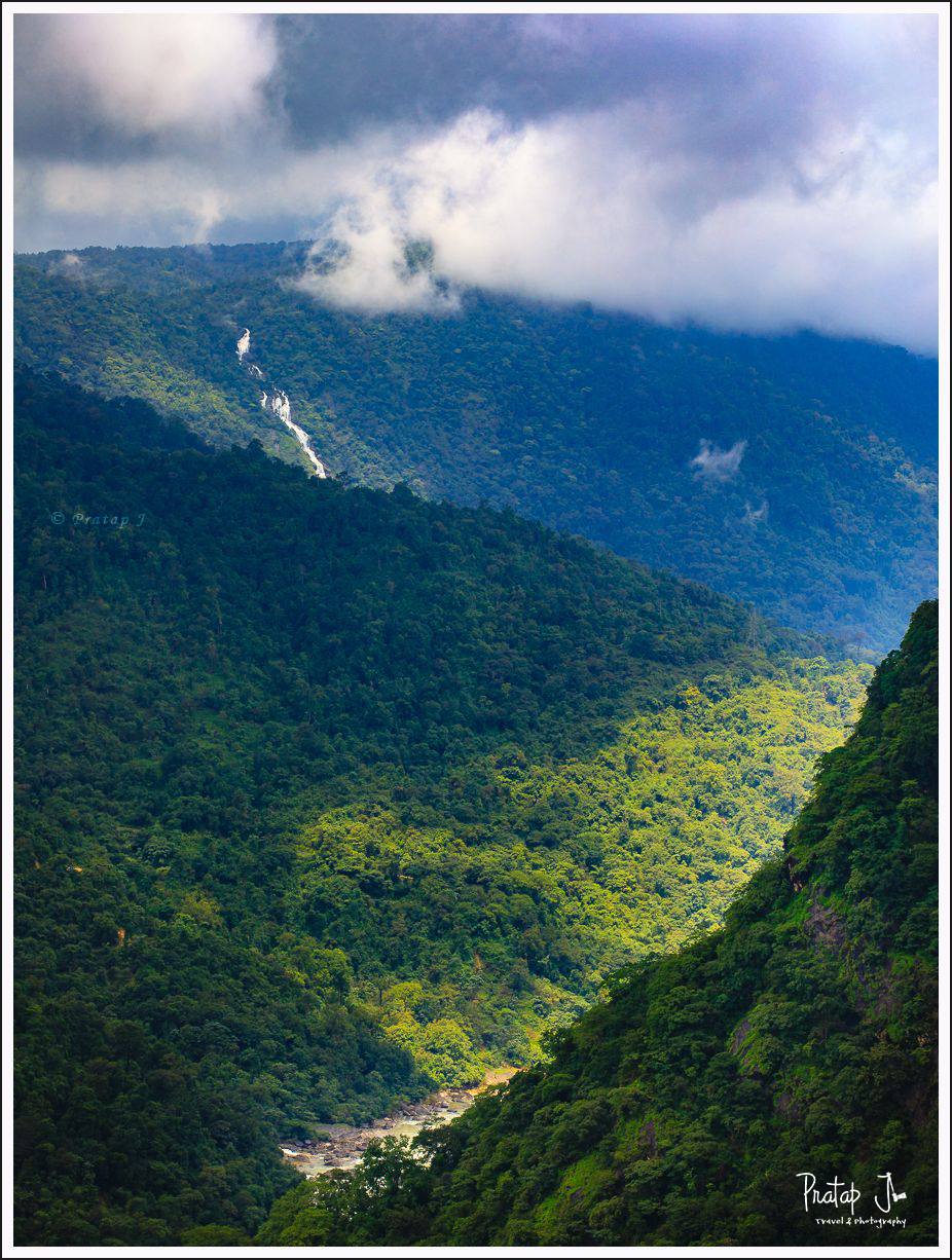 Play of light and shadow on the mountains near Jog falls