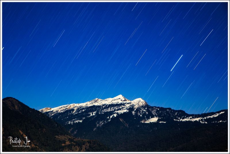 Chandrashila Peak and Star Trails over the Himalayas